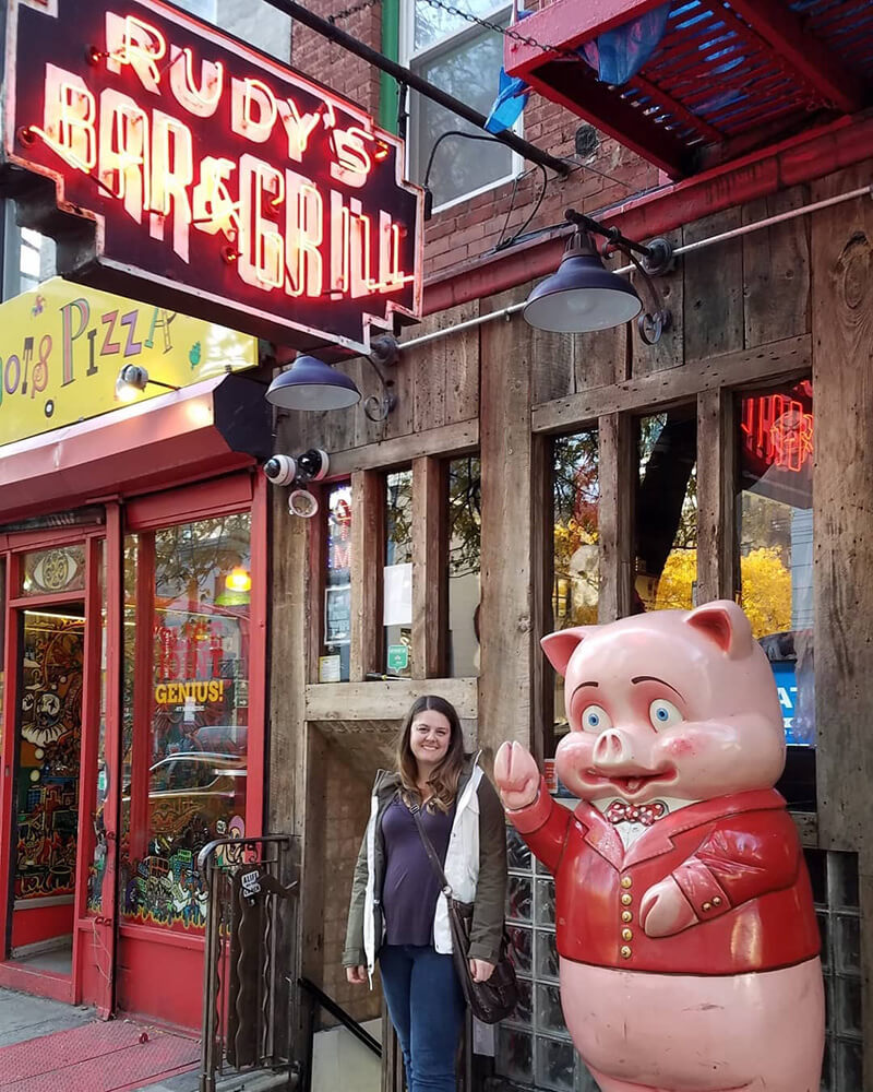 Barbara in front of Rudy's Dive Bar in New York