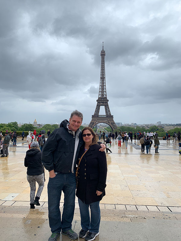 Mom and Dad in front of the Eiffel Tower