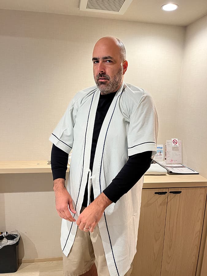 mark in a robe in tokyo