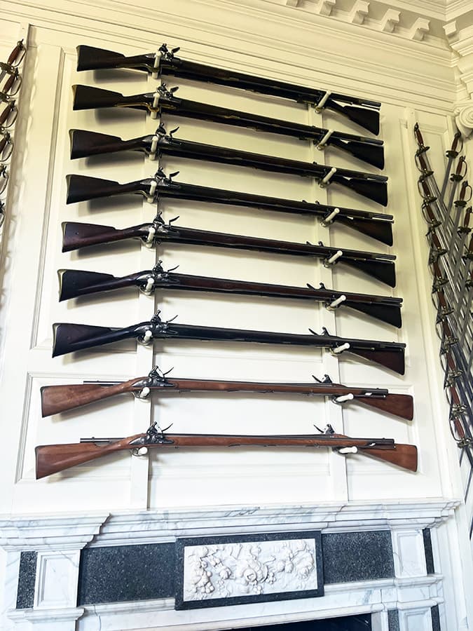 governors palace guns on wall